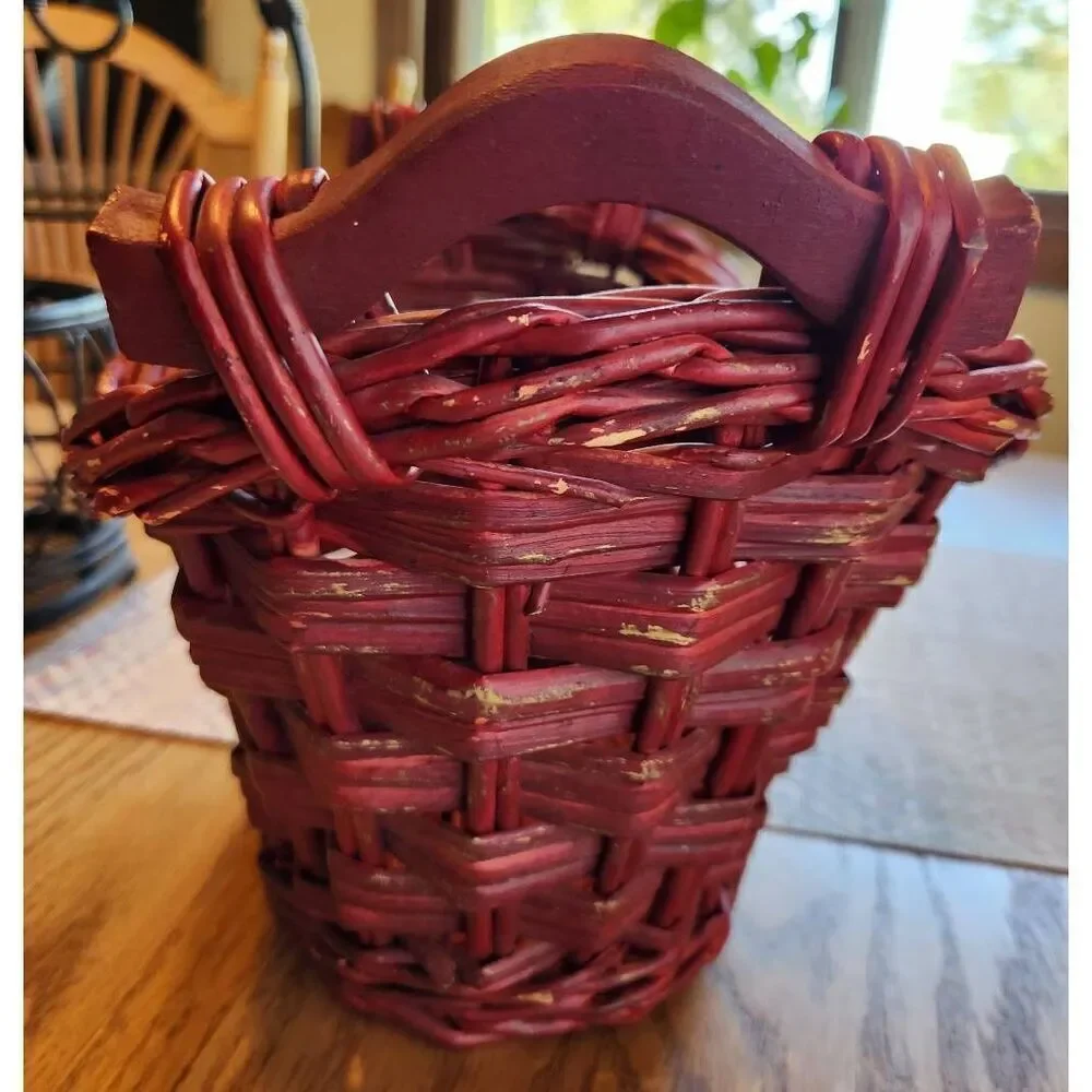 Red basket with wood handles